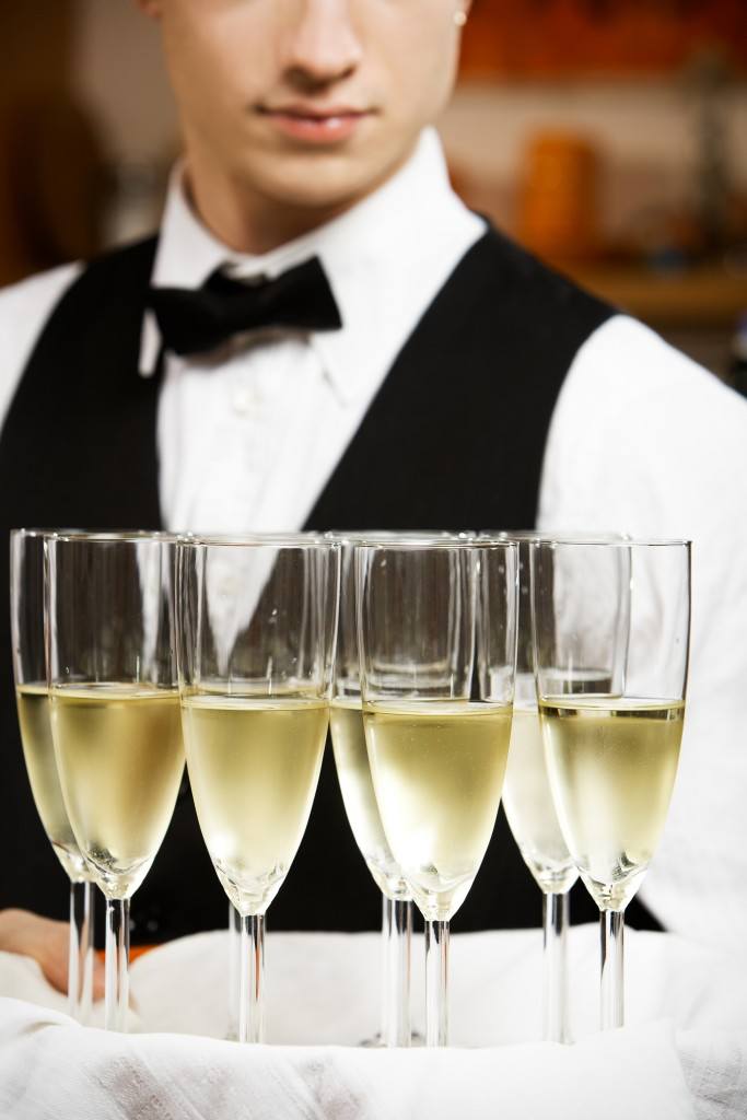 champagne glasses waiter