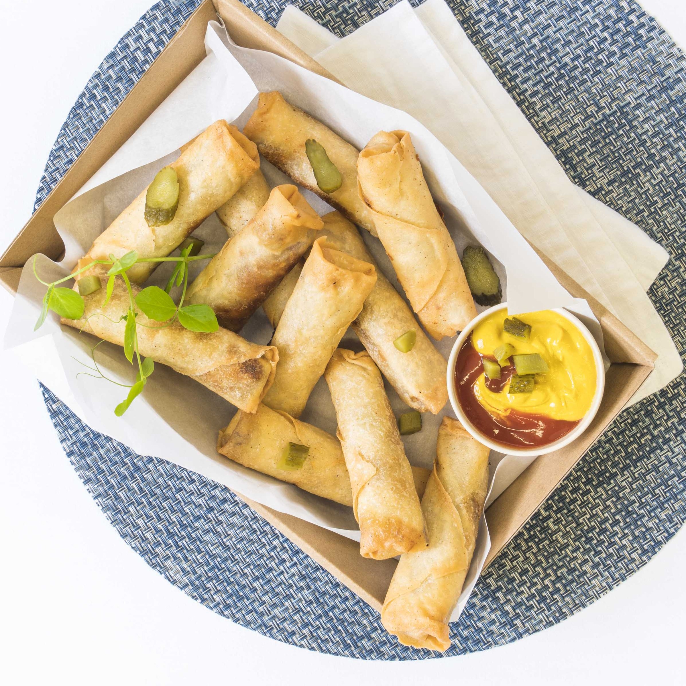 Cheeseburger spring roll, mustard, pickles & ketchup