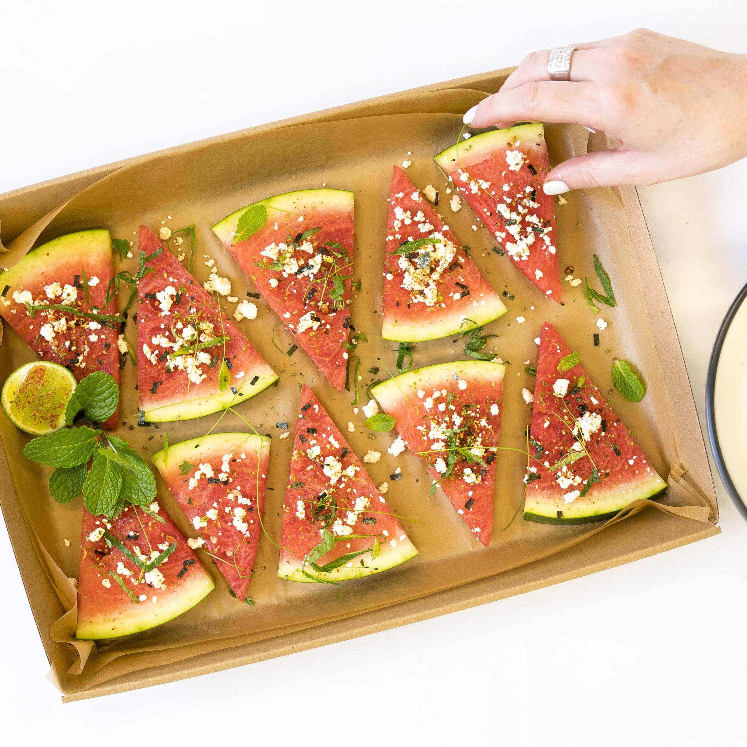 Compressed-Watermelon-Disposable Compressed watermelon, togarashi, feta, mint and a squeeze of fresh lime