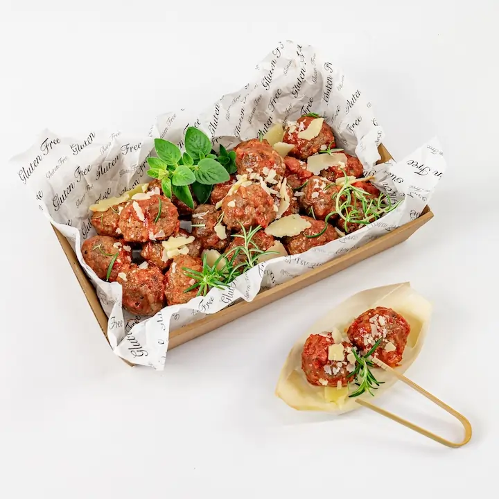 Nonna’s meatballs, rich tomato glaze, shaved parmesan, roasted cherry tomatoes