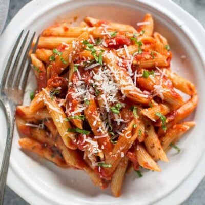 Penne pasta, roasted tomato sauce, olive, chilli & capers