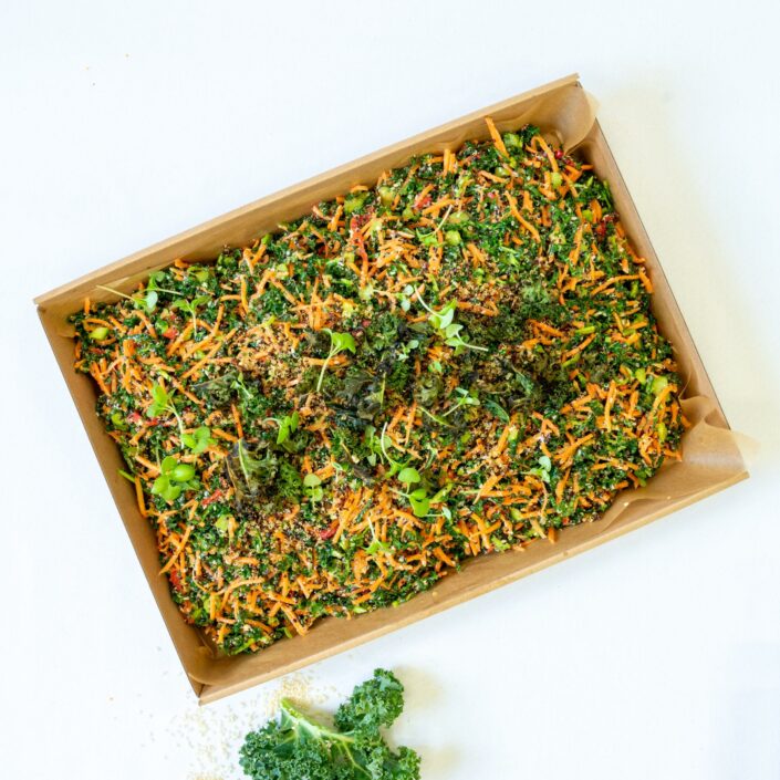 Superfoods salad of kale & quinoa, fresh vegetables, tahini dressing
