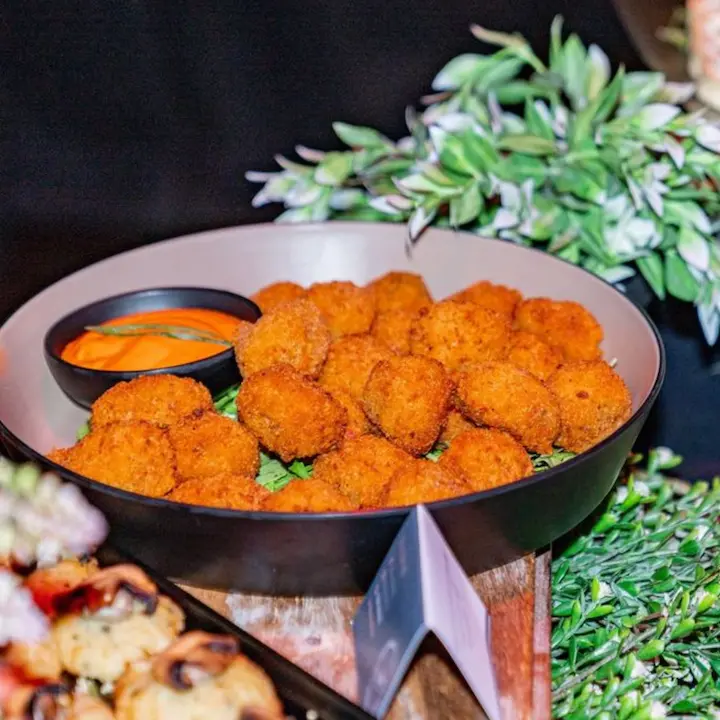 Italian tomato arancini, citrus crema