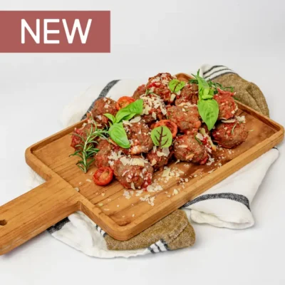 Nonna’s meatballs, rich tomato glaze, shaved parmesan, roasted cherry tomatoes