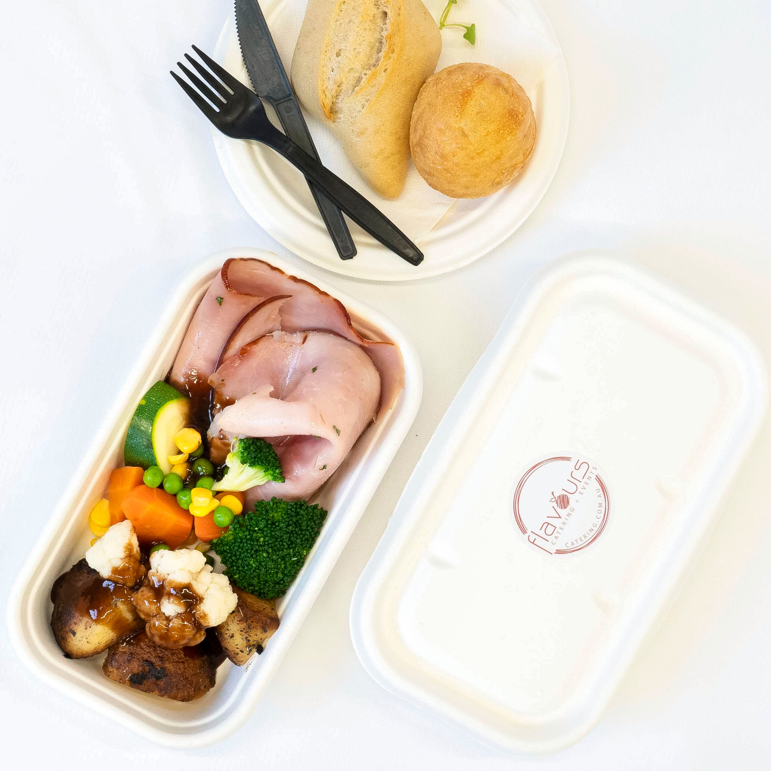Individual Christmas Ham hot meal sq Orange & maple glazed ham, roasted potatoes, vegetables & gravy