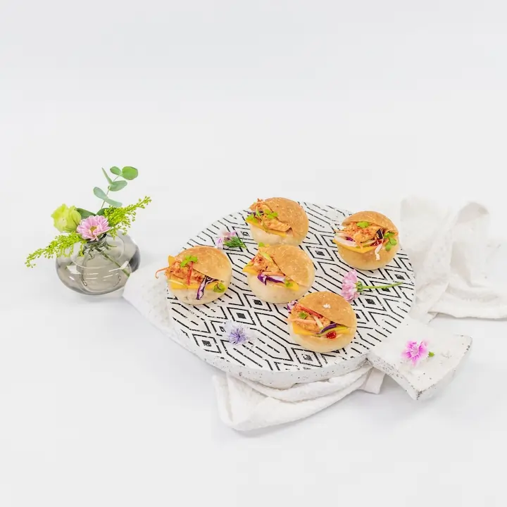 Peri peri chicken slider, American cheese, crunchy apple slaw & spiked chipotle mayo