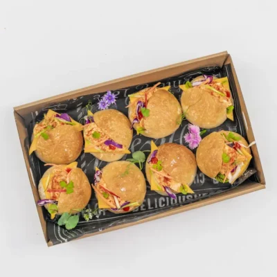 Peri peri chicken slider, American cheese, crunchy apple slaw & spiked chipotle mayo