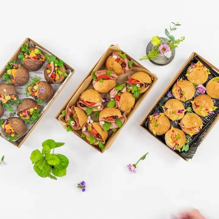 Mexican black bean slider, charred corn salsa, guacamole, tomato, lettuce and crunchy corn chips