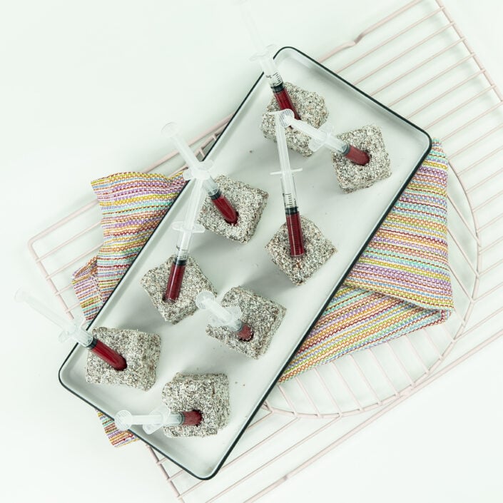 Little Aussie Lamingtons with berry jam syringe