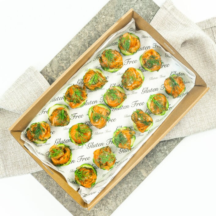Gravlax - Dill cured salmon on cucumber disc, mustard dill dressing