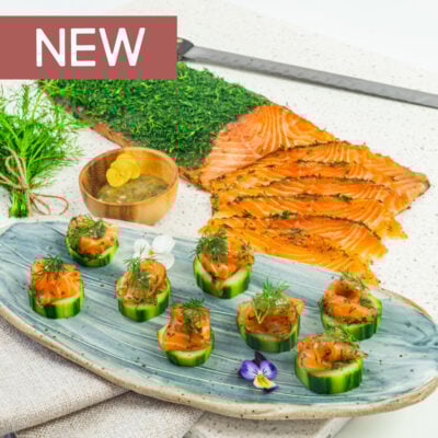 Gravlax - Dill cured salmon on cucumber disc, mustard dill dressing