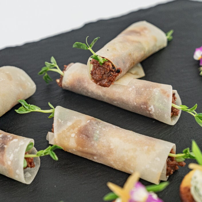 Korean beef cigar, gochujang, soy and honey glaze, cucumber, young shallot