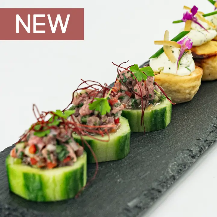 2-low-res-Drop-Off-catering---thai-beef-salad-cucumber-disc----cover-w-New-tag