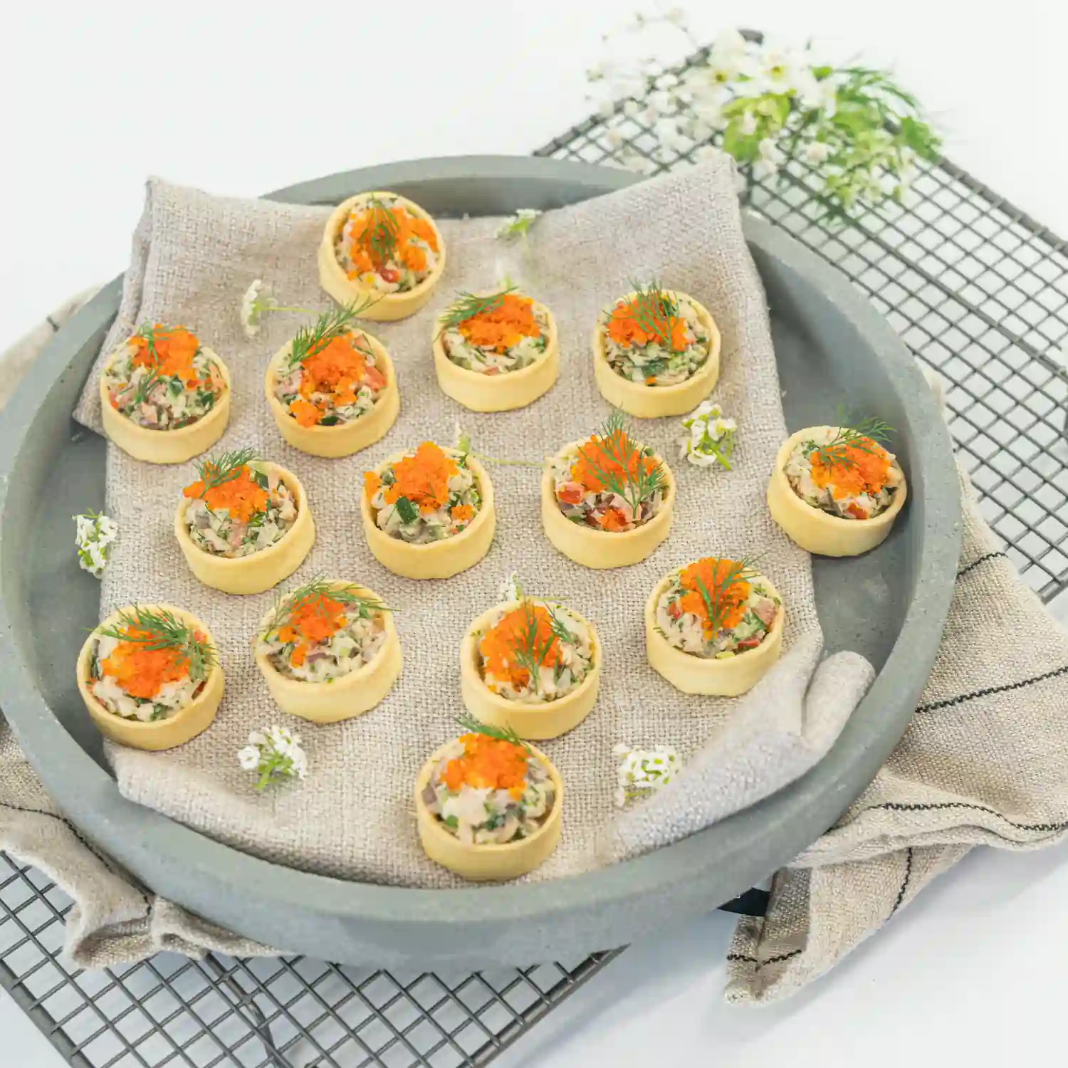 Blue swimmer crab tartlet, caviar pearls, native pickled onion and lemon myrtle mayo