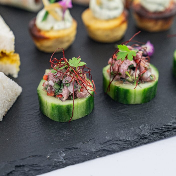 Thai beef salad cucumber disc, kaffir lime, chilli thread, crushed peanuts, baby coriander