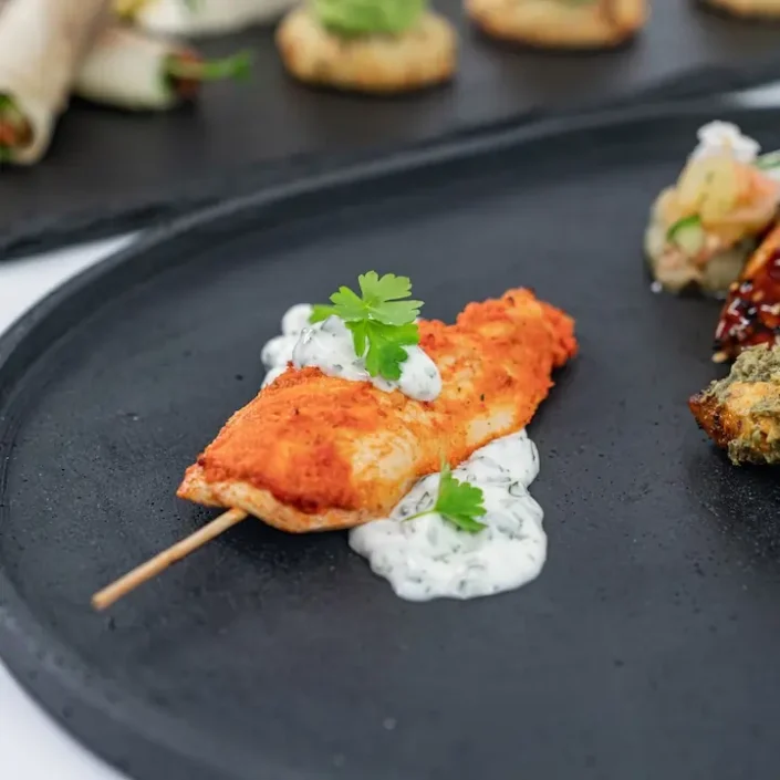 Portuguese-style chicken skewer, cracked pepper, coriander-lemon yoghurt