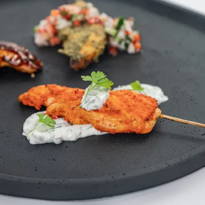 Portuguese-style chicken skewer, cracked pepper, coriander-lemon yoghurt