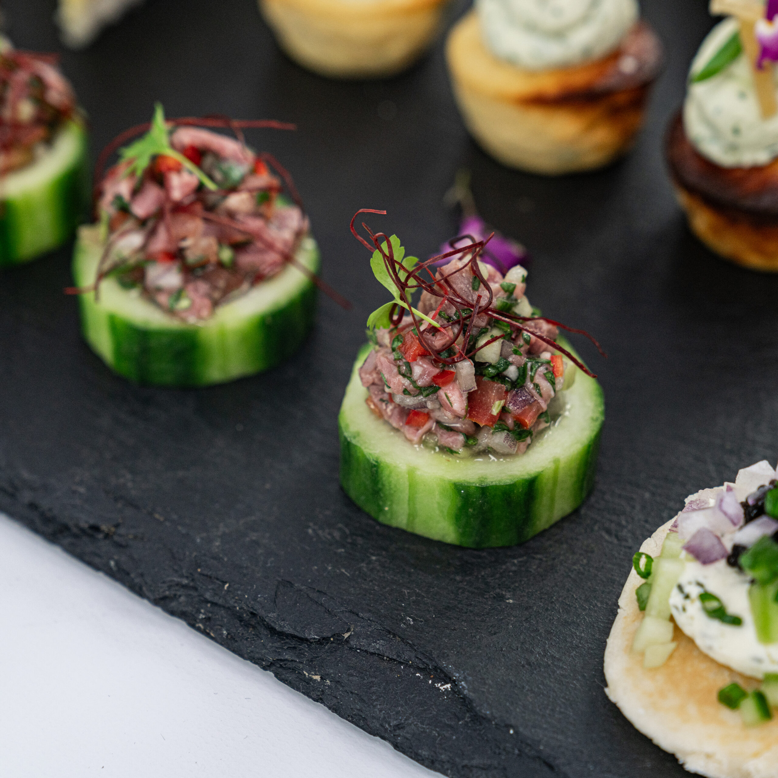 Thai beef salad cucumber disc, kaffir lime, chilli thread, crushed peanuts, baby coriander