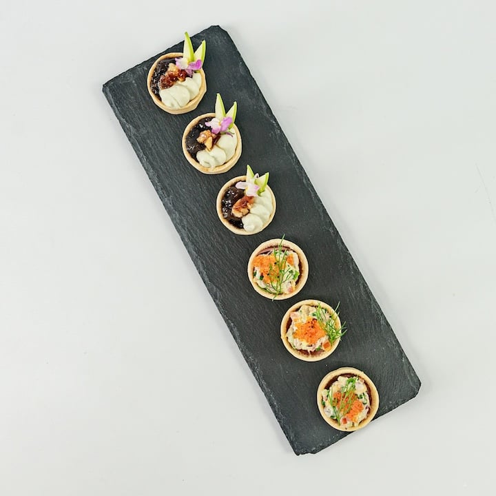 Blue swimmer crab tartlet, caviar pearls, native pickled onion and lemon myrtle mayo