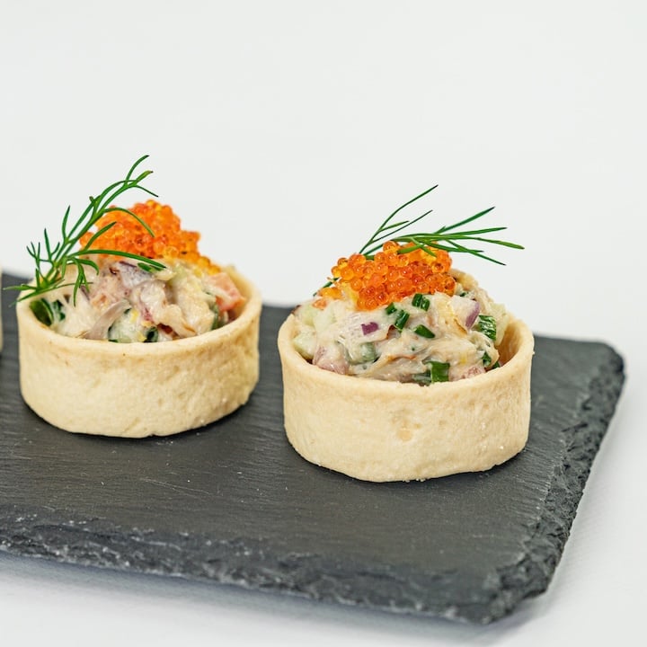 Blue swimmer crab tartlet, caviar pearls, native pickled onion and lemon myrtle mayo