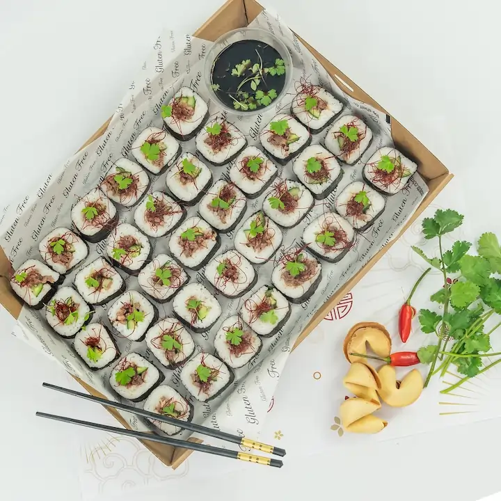 Beef teriyaki roll, white rice, seaweed, cucumber, baby coriander, chilli threads, soy dipping sauce