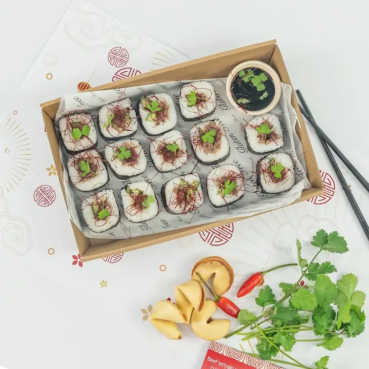 Beef teriyaki roll, white rice, seaweed, cucumber, baby coriander, chilli threads, soy dipping sauce