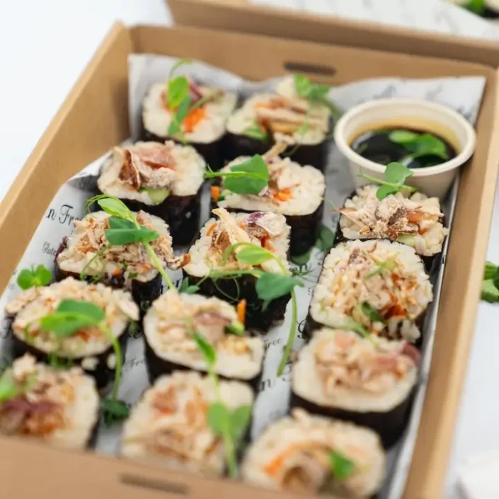 Tofu & vegetable roll, brown rice, seaweed, crisp onions, baby snow pea, soy dipping sauce