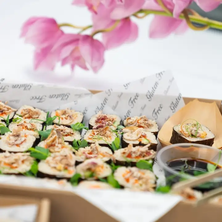 Tofu & vegetable roll, brown rice, seaweed, crisp onions, baby snow pea, soy dipping sauce