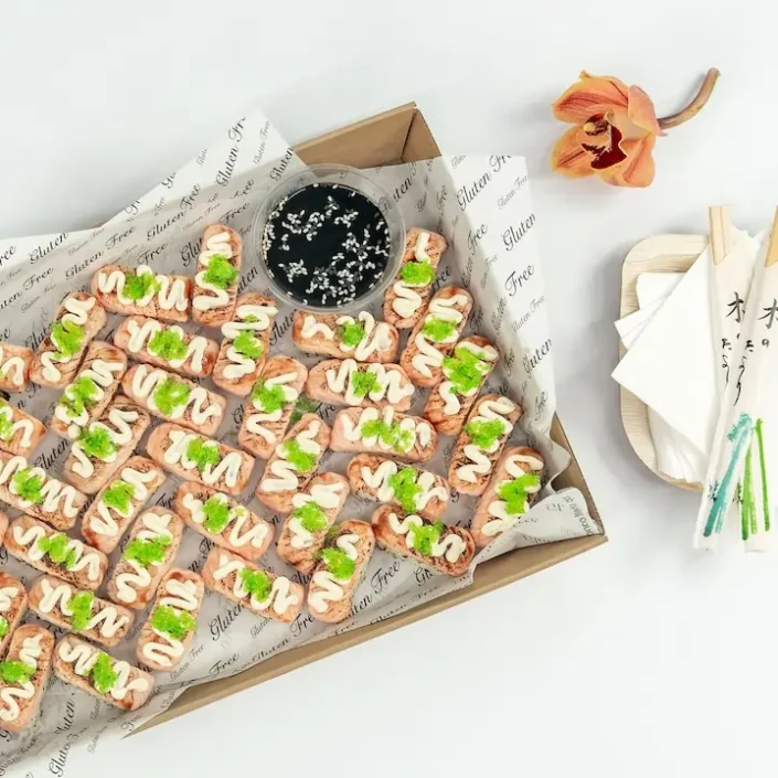Flame grilled salmon nigiri, teriyaki glaze, wasabi fish roe