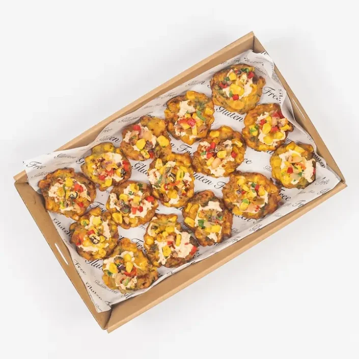 Mini corn fritter, chipotle pulled chicken, smoked paprika & pineapple corn salsa