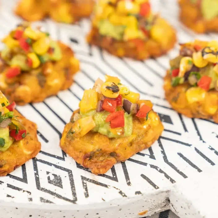 Charred sweetcorn fritter, avocado crema & pineapple corn salsa
