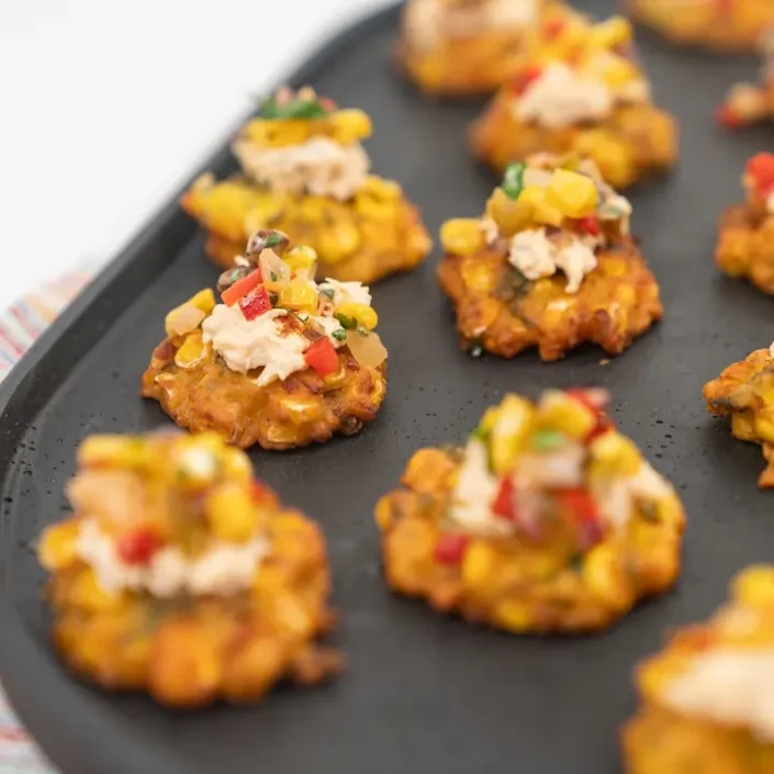 Mini corn fritter, chipotle pulled chicken, smoked paprika & pineapple corn salsa