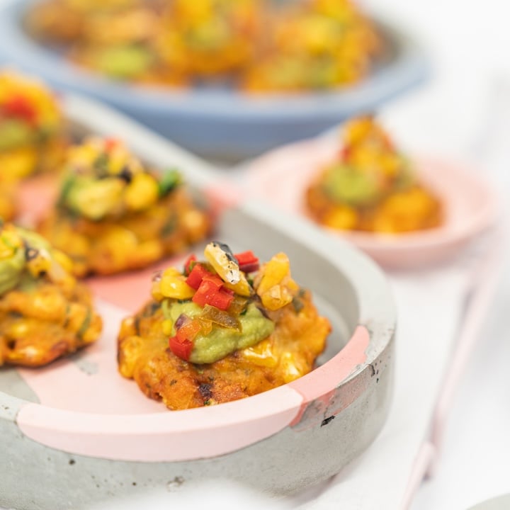 Charred sweetcorn fritter, avocado crema & pineapple corn salsa