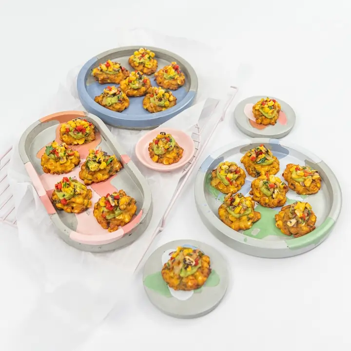 Charred sweetcorn fritter, avocado crema & pineapple corn salsa