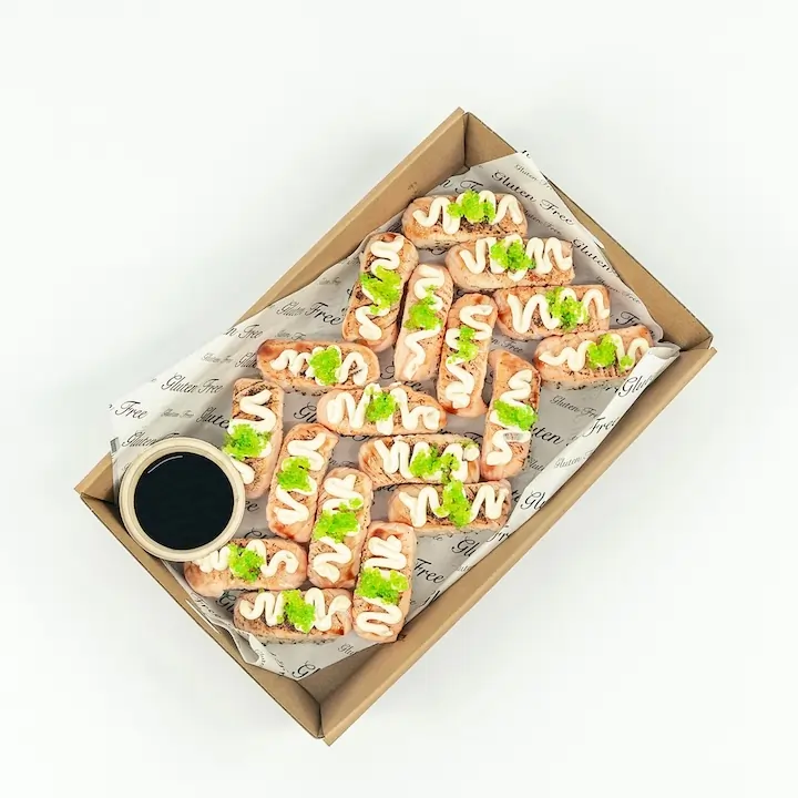 Flame grilled salmon nigiri, teriyaki glaze, wasabi fish roe