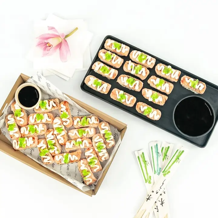 Flame grilled salmon nigiri, teriyaki glaze, wasabi fish roe