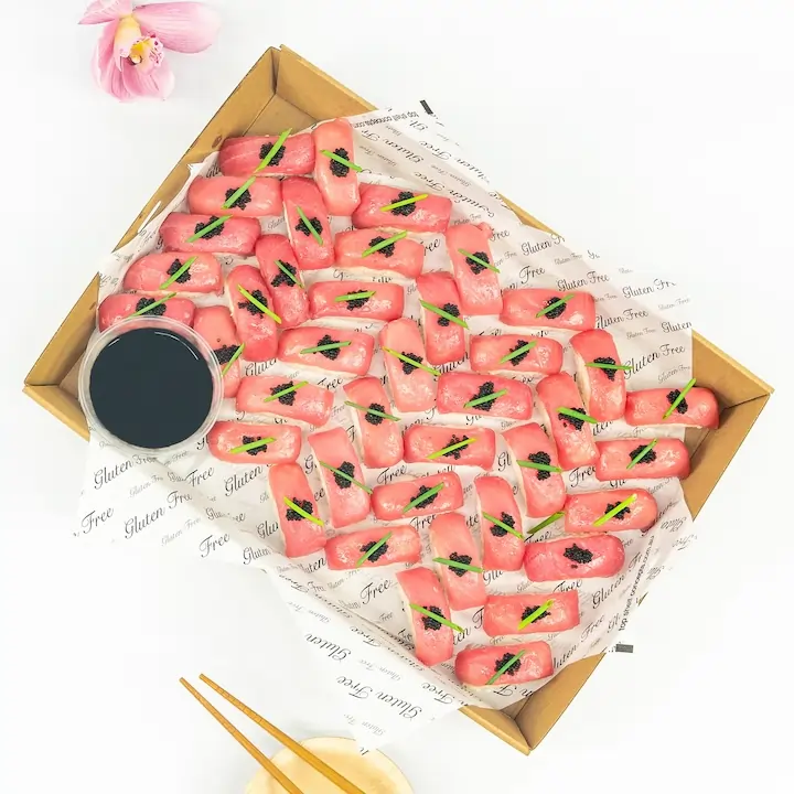 Raw tuna nigiri, black caviar, chive