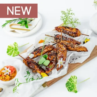 Teriyaki-glazed chicken skewer, toasted sesame, ginger-pineapple relish