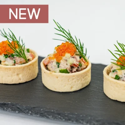 Blue swimmer crab tartlet, caviar pearls, native pickled onion and lemon myrtle mayo