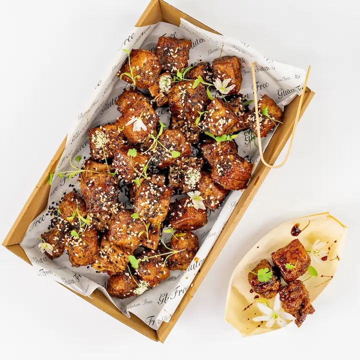 Sticky pork belly bites, sweet soy, sesame, spring onion & fresh chilli