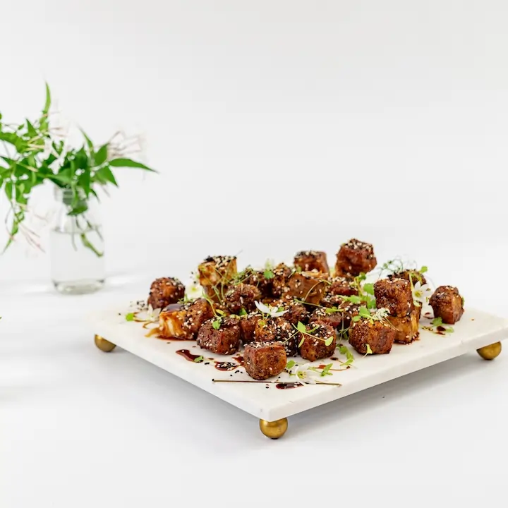 Sticky pork belly bites, sweet soy, sesame, spring onion & fresh chilli