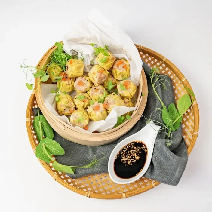 Chicken and prawn siu mai, light soy, fresh chilli, flying fish roe