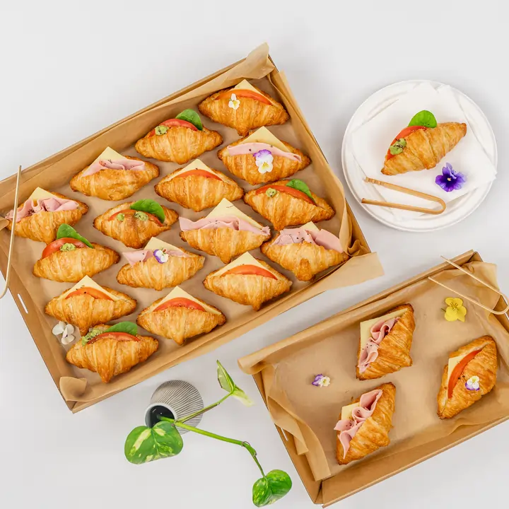 Mini vegan croissants filled with avocado, tomato & spinach
