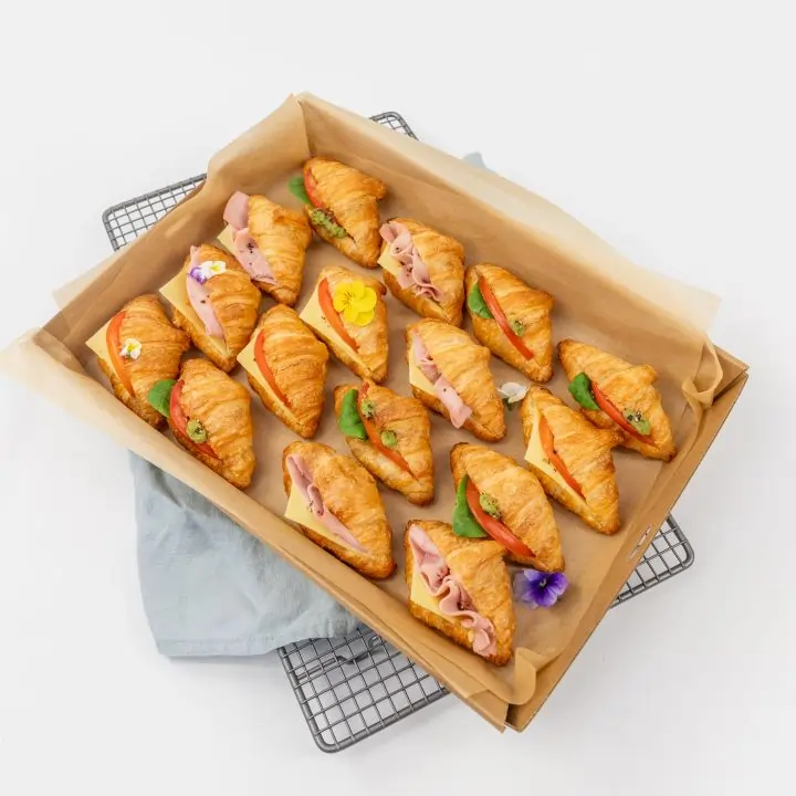 Mini vegan croissants filled with avocado, tomato & spinach