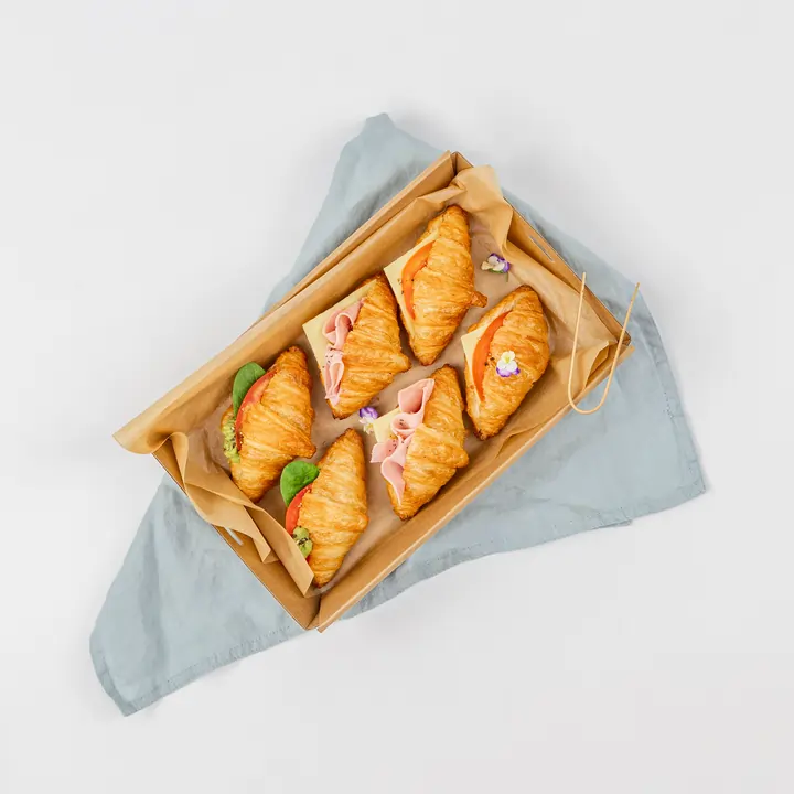 Mini vegan croissants filled with avocado, tomato & spinach